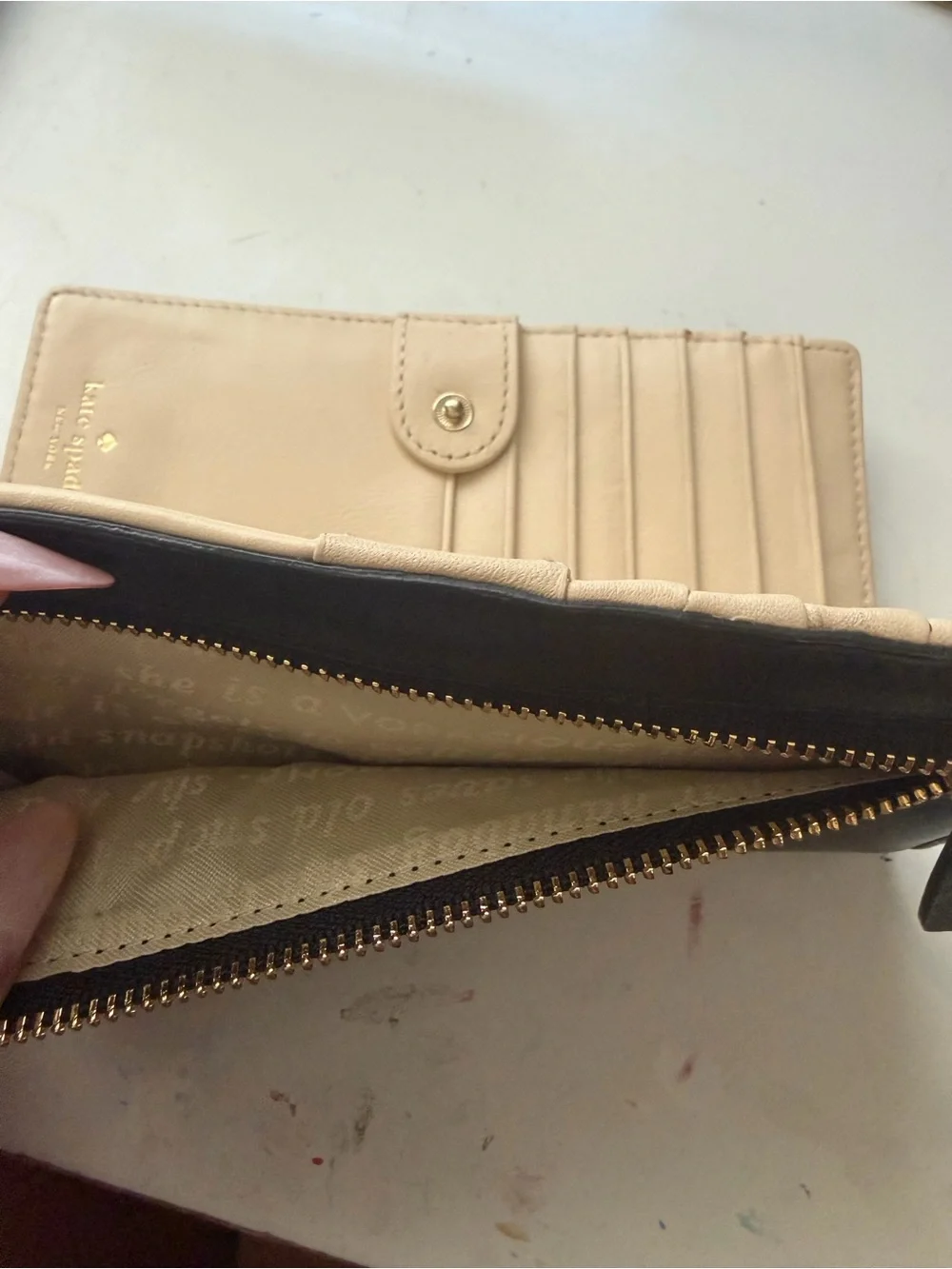 kate spade Black Leather Zip-Around Wallet with Gold Logo